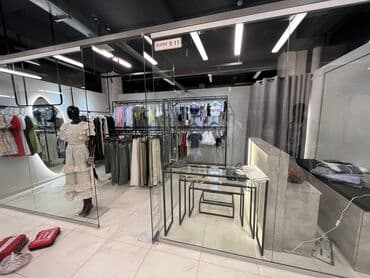 оборудование в бутик: Стеллажи для бутика одежды Кронштейны для бутика одежды Торговое — 12