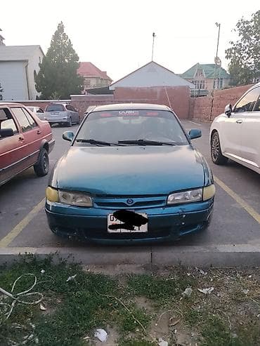 Mazda 626: 1993 г., 1.8 л, Механика, Бензин, Седан — 1