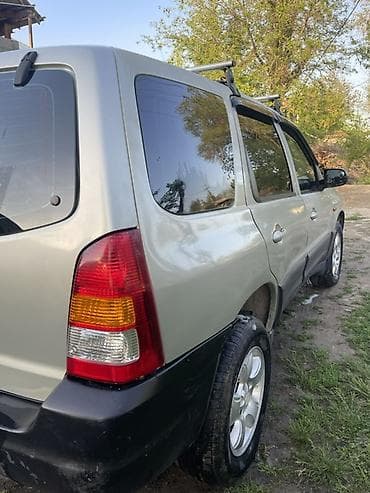 трибут: Mazda Tribute: 2003 г., 2 л, Бензин, Кроссовер — 4