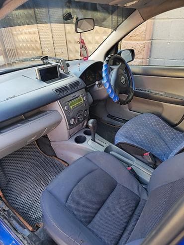 торпеда: Mazda Demio: 2004 г., 1.5 л, Автомат, Бензин, Хэтчбэк — 4