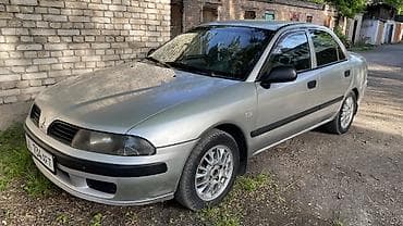 1 mz: Mitsubishi Carisma: 2001 г., 1.6 л, Механика, Газ, Седан — 2
