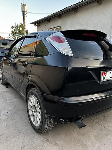 step 2: Ford Focus: 2003 г., 2 л, Ручные, Бензин, Хэтчбэк — 2