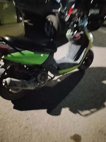 bmb 39: Скутер/мопед городского типа, ярко‑зелёный с чёрными элементами — 5