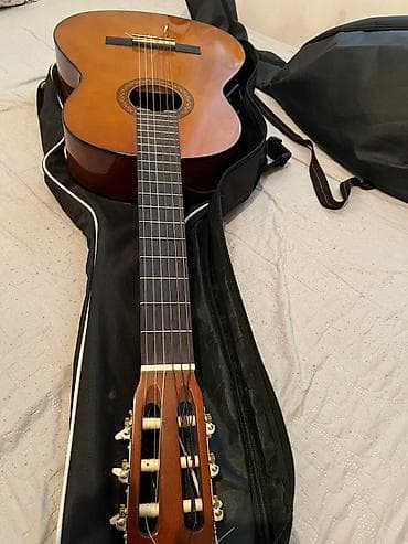 ямаха гитара: Классическая электроакустическая гитара Yamaha с нейлоновыми струнами — 6