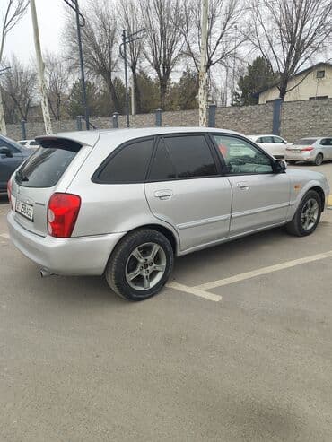 Ламинат: Mazda 323: 2002 г., 1.5 л, Автомат, Бензин, Универсал — 8