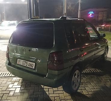 машина mazda demo: Mazda Demio: 2000 г., 1.6 л, Ручные, Бензин, Универсал — 1