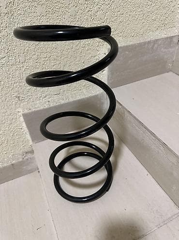 Пружина передняя от авто Ниссан тино и сефиро 
Новый