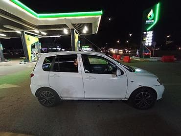 mx 5: Mazda Demio: 2004 г., 1.3 л, Механика, Бензин, Хэтчбэк — 4