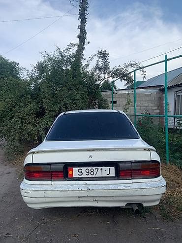124 e500: Mitsubishi Lancer: 1988 г., 1.8 л, Механика, Бензин, Седан — 1