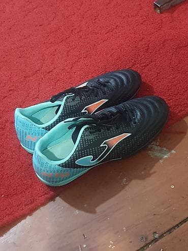 Футбольные бутсы/сороконожки Joma для игры на искусственных покрытиях