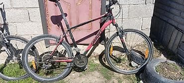 1) Giant Revel (красно‑чёрный хардтейл) - Колёса 26" с полугладкими