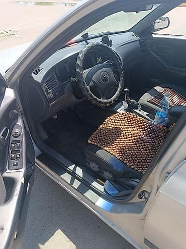 элантра 2004: Hyundai Elantra: 2003 г., 1.6 л, Механика, Бензин, Седан — 7