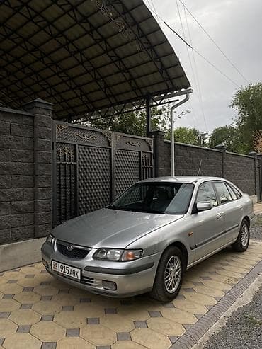 авто в такси: Mazda 626: 1999 г., 2 л, Механика, Бензин, Седан — 1
