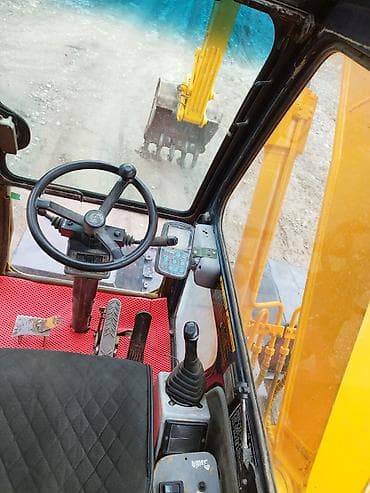 Коммерческий транспорт: Экскаватор, Hyundai, 2000 г., Колесный — 5