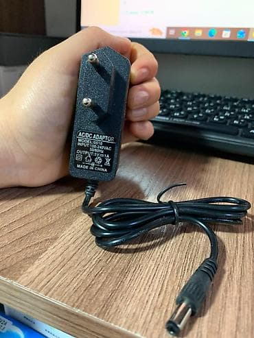 ac: Универсальный сетевой адаптер (AC/DC Adapter) 5В 1А - Вход — 2