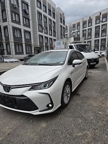 aion v plus: Toyota Corolla: 2021 г., 1.8 л, Гибрид, Седан — 2
