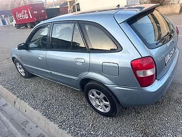 Транспорт: Mazda 323: 2001 г., 1.6 л, Механика, Бензин, Универсал — 3