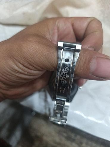 Личные вещи: Часы Rolex Oyster Perpetual с зелёным циферблатом. - Корпус и — 3
