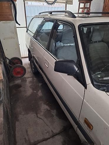 90: Mazda 626: 1993 г., Универсал — 2