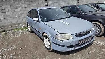 ключ на бмв: Mazda Familia: 2000 г., Механика, Бензин, Универсал — 4