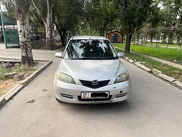 Транспорт: Mazda Demio: 2004 г., 1.3 л, Автомат, Бензин, Хэтчбэк — 2