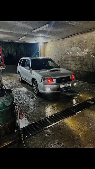 Subaru Forester: 2004 г., 2 л, Бензин