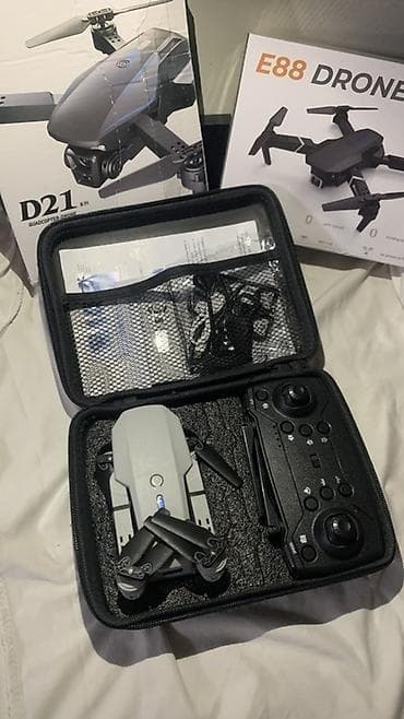 ufc диск: Квадрокоптер E88 DRONE (14+) - Складная конструкция: компактные лучи — 3