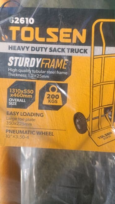 хозяйственную тележку: Желтая тележка-транспортер Tolsen 62610 с двумя пневматическими — 3