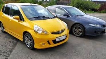 малолитражные авто: Жёлтый компактный хэтчбек (5 дверей) с аэродинамическим обвесом и — 2