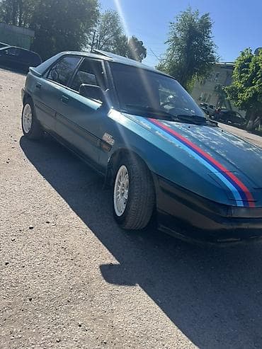 key maker: Mazda 323: 1994 г., 1.6 л, Ручные, Бензин, Хэтчбэк — 3