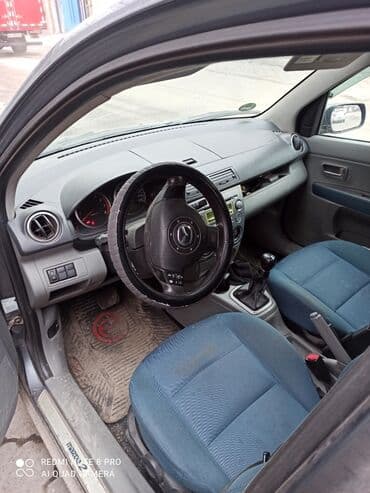 чехол на демио: Mazda 2: 2004 г., 1.4 л, Автомат, Бензин, Хэтчбэк — 4