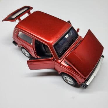 автомат с орбизами мощный: Нива. Модель. Металлический. Все части подвижные. Открываются и — 2