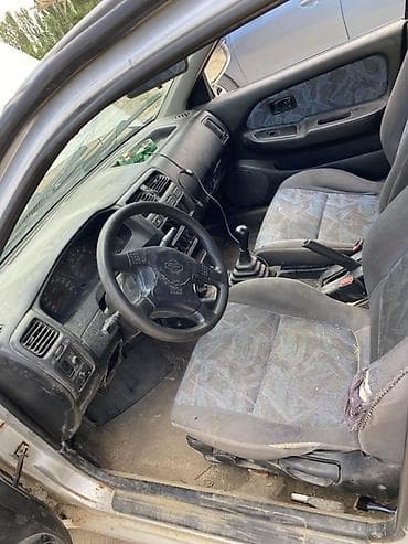 Унаа: Nissan Almera: 1999 г., Кол менен иштөөчү, Бензин, Хетчбек — 4