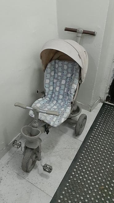 Детский трёхколёсный велосипед‑коляска с ручкой для родителей