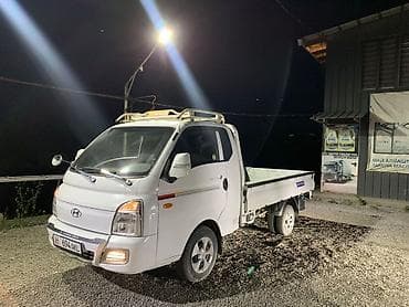 Унаа: Hyundai Porter II — компактный бортовой грузовик - Кабина на двоих — 1