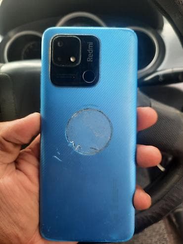 google pixel 8a: Смартфон Redmi (линейка Redmi серии 10/Note, корпус синего цвета) — 1