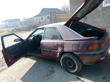 audi s2: Mazda 323: 1993 г., 1.6 л, Механика, Бензин — 4