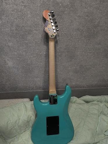 сингл: Электрогитара в стиле Stratocaster, цвет Surf Green (бирюзовый) — 2