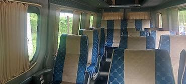 кунан жылкы: Буйрутмага жүргүнчүлөрдү ташуучу бус — 7