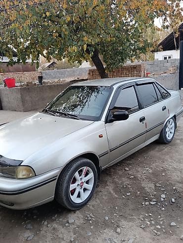 Транспорт: Daewoo Nexia: 2004 г., 1.6 л, Кол менен иштөөчү, Бензин, Седан — 5