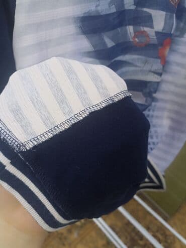 спортивное оборудование: Футболки — 2