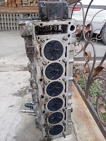 Глушители: Мерс .210.3.2 дизель Состав: - Головка блока цилиндров на 6 цилиндров — 2