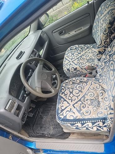 Продажа авто: Mazda Demio: 1998 г., 1.5 л, Механика, Бензин, Минивэн — 7