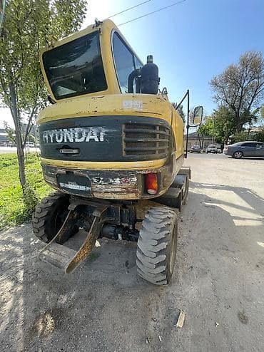 892 2: Экскаватор, Hyundai, 2012 г., Колесный — 7