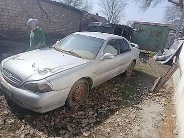 баа: Kia Credos: 1998 г., 2 л, Кол менен иштөөчү, Бензин, Седан — 2