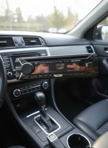 сабвуфер в авто: Автомагнитола Sony DV-5666 - Формат 1-DIN. - Встроенный — 2