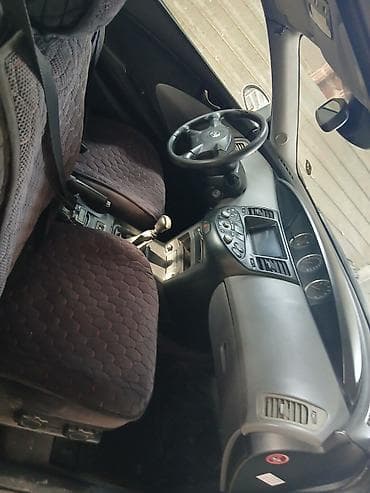 4: Nissan Primera: 2002 г., Бензин, Лифтбек — 6