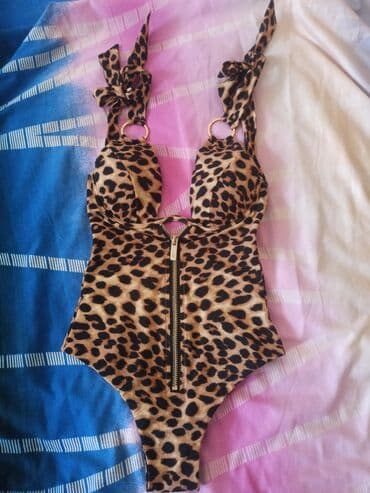 купальники з високою посадкою: Продаю купальник. Пришёл не по-размеру, бирку сорвала, но он новый — 4