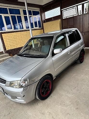 баги: Mazda Demio: 2001 г., 1.3 л, Автомат, Бензин, Хэтчбэк — 1