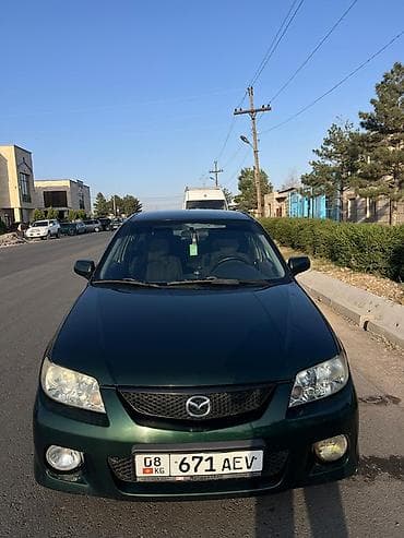 Mazda 323: 2000 г., 2 л, Механика, Бензин, Хэтчбэк